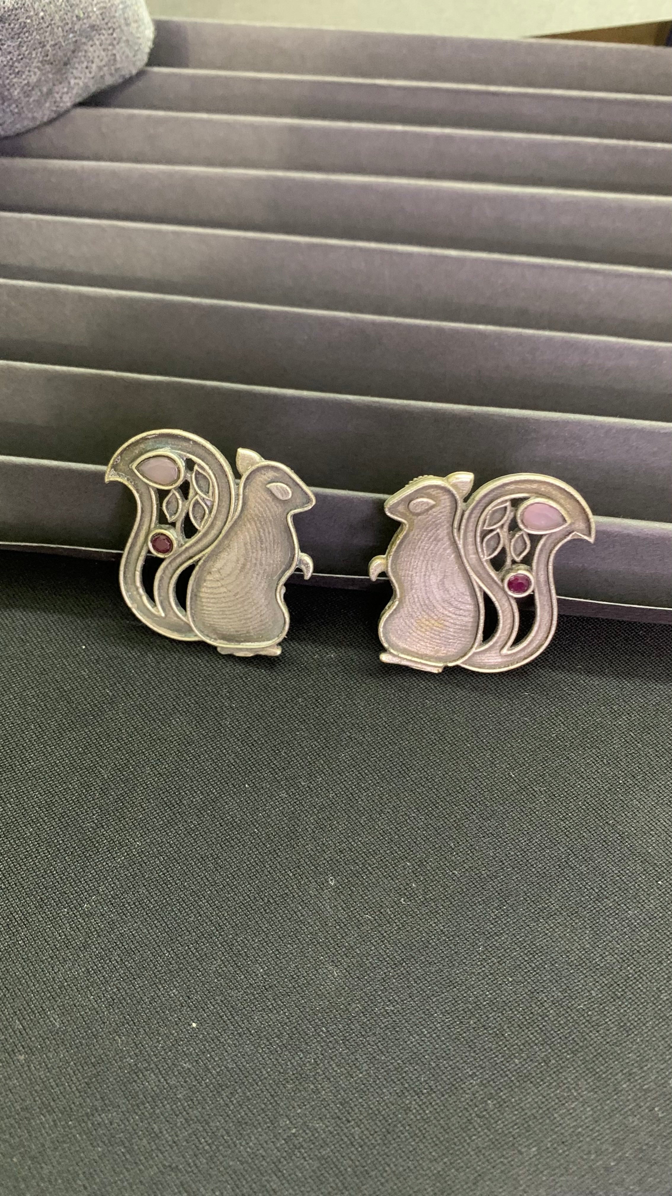 OZEL OXIDISED SILVER PLATED WITH RED STONE SQUIRREL SHAPED EAR STUDS