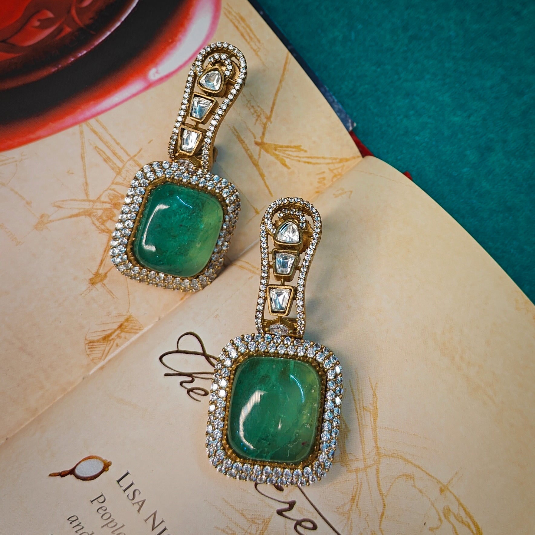 Ozel Gold Plated Kundan Moissonite Polki and American Diamonds Green Stone Earrings