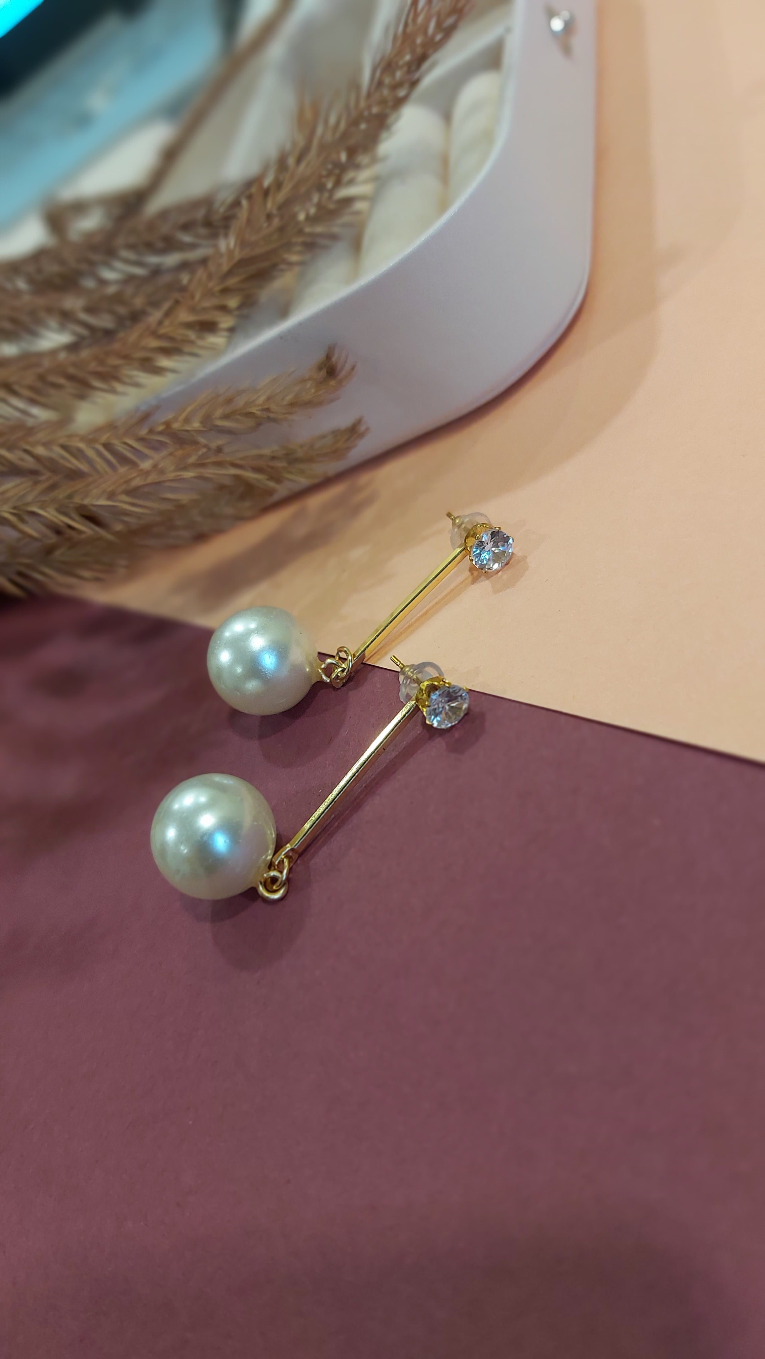 DANGLING PEARL EARRING WITH SOLITAIRE STUD