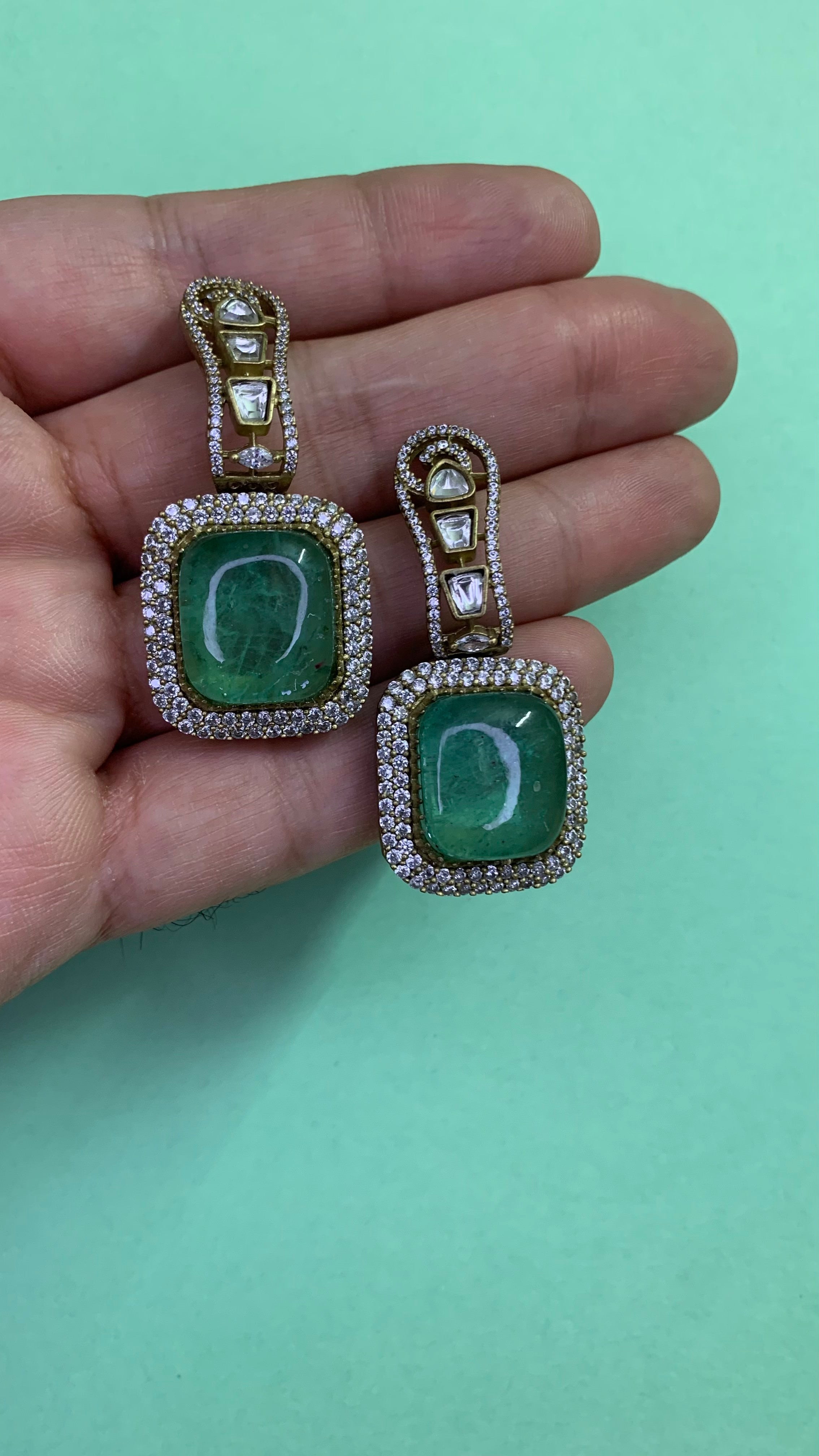 Ozel Gold Plated Kundan Moissonite Polki and American Diamonds Green Stone Earrings