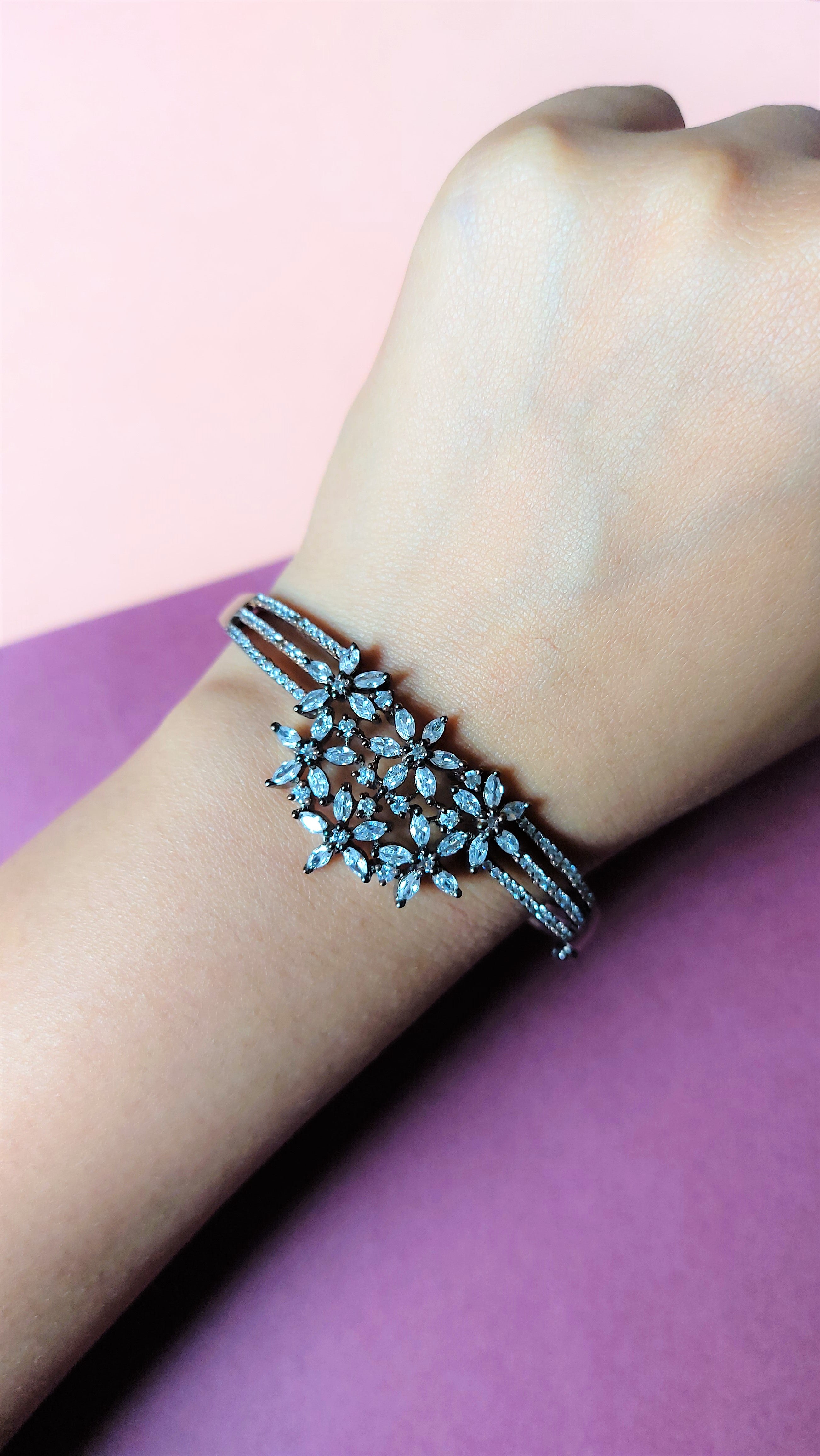 BLACK AND ROSE GOLD PLATED AMERICAN DIAMOND OPENABLE BRACELET