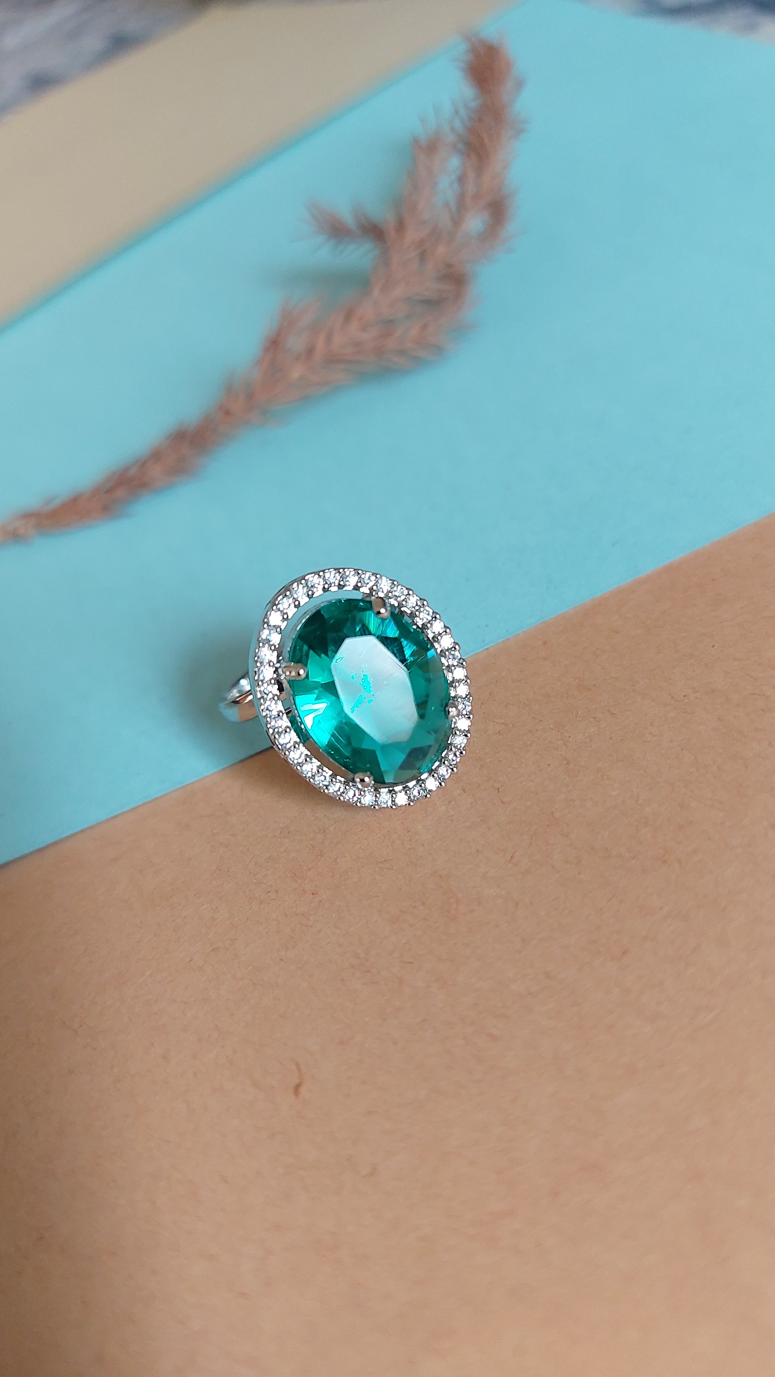 OVAL CUT EMERALD STONE WITH AMERICAN DIAMOND ADJUSTABLE RING