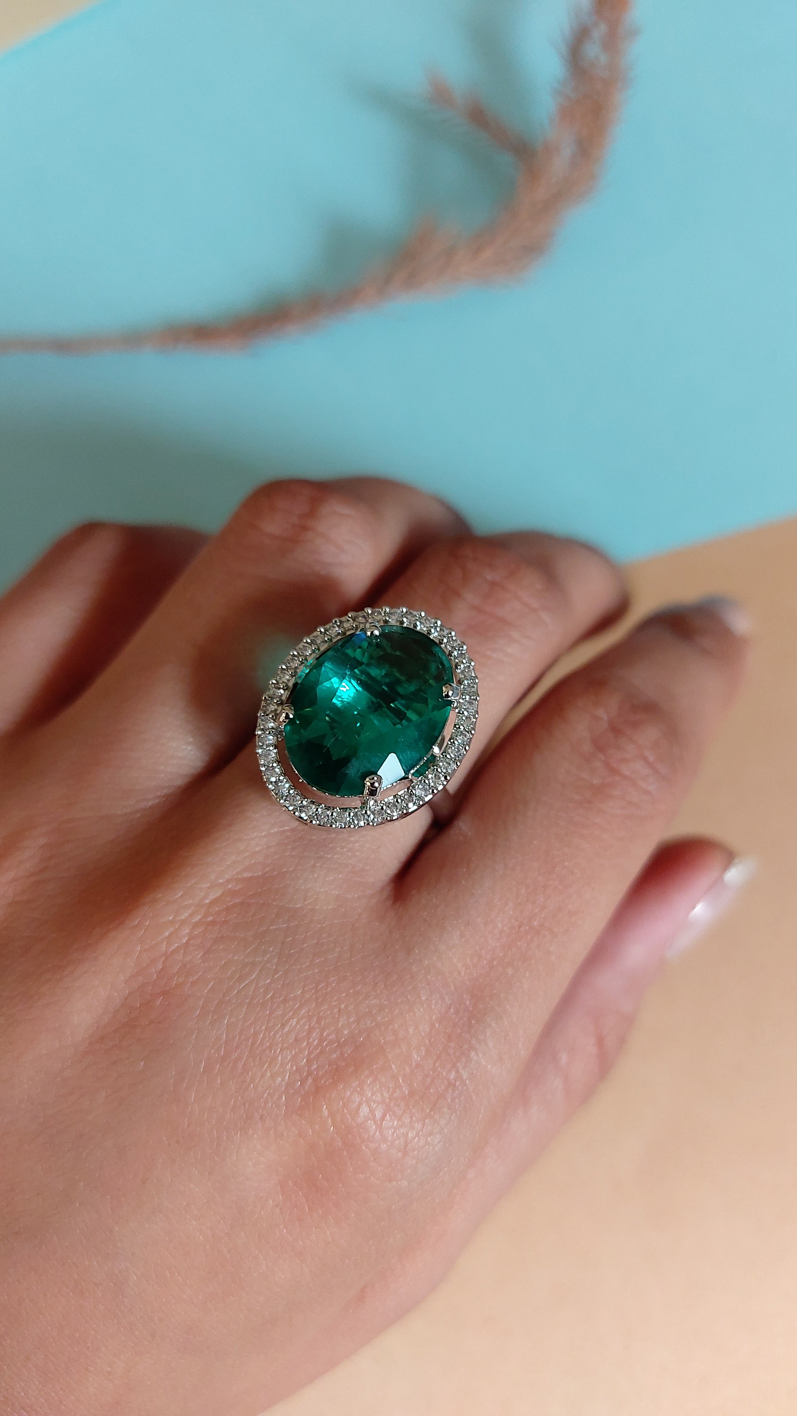 OVAL CUT EMERALD STONE WITH AMERICAN DIAMOND ADJUSTABLE RING