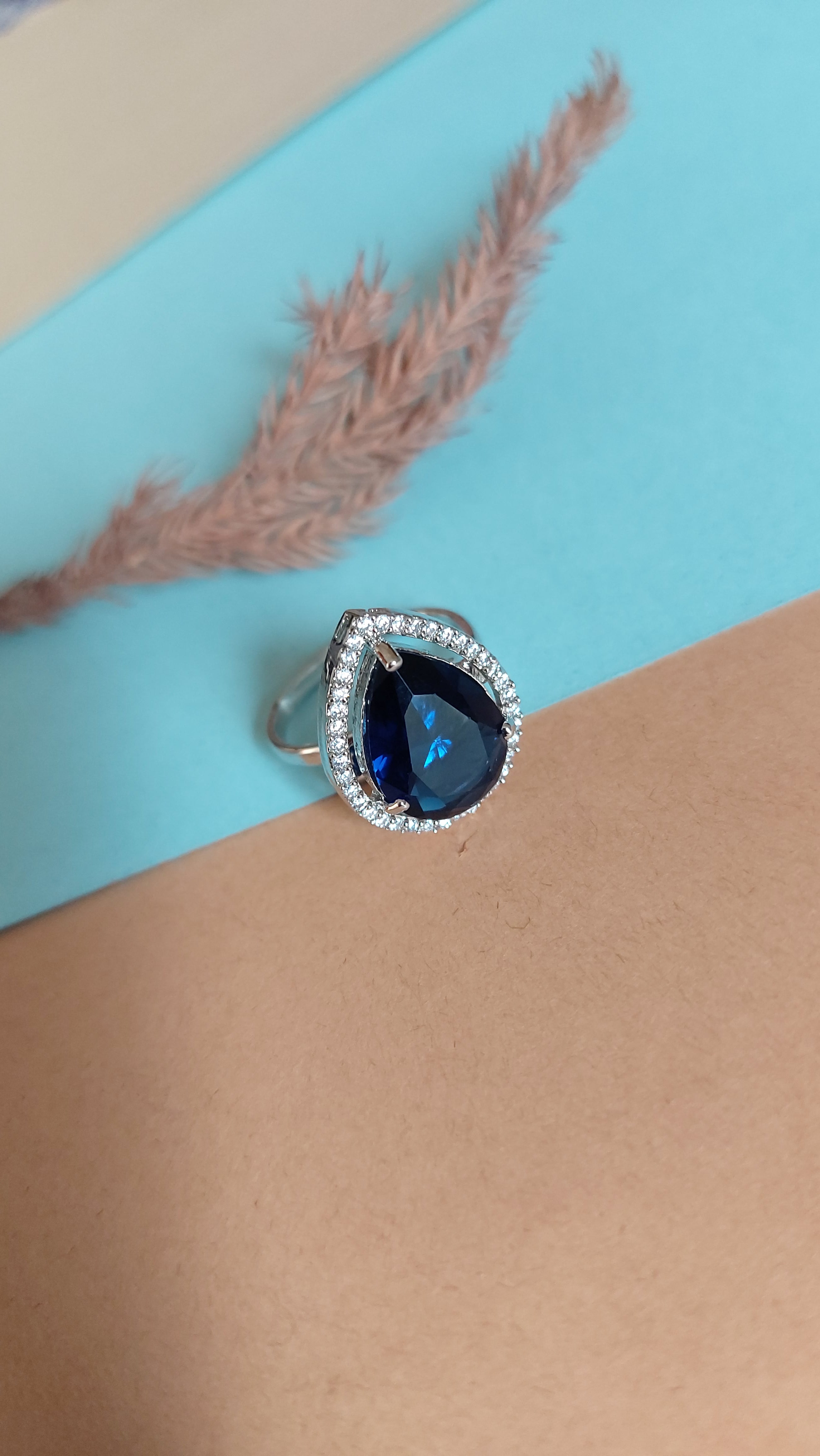 PEAR CUT BLUE SAPPHIRE STONE WITH AMERICAN DIAMOND ADJUSTABLE RING