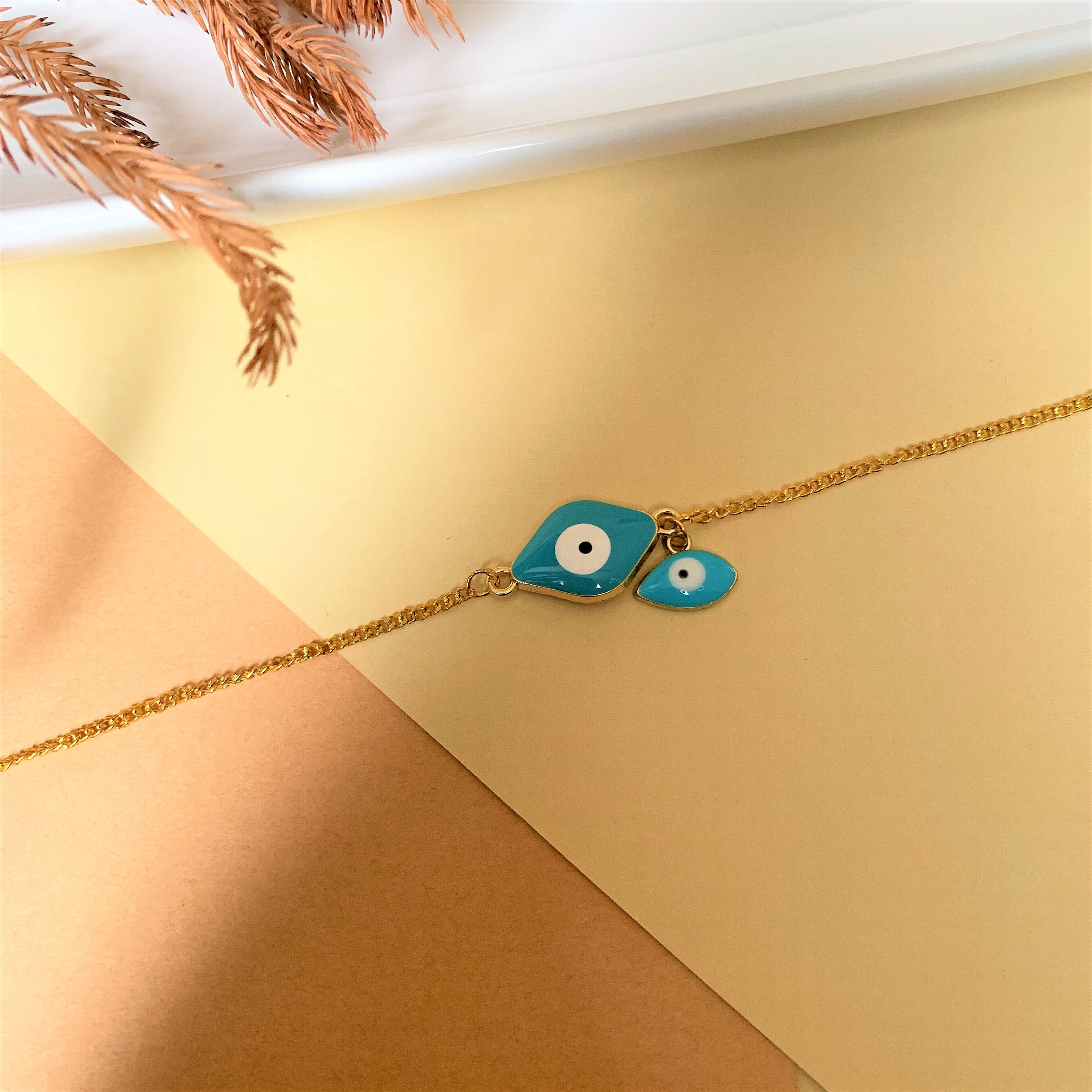 EVIL EYE BRACELET WITH HANGING CHARM