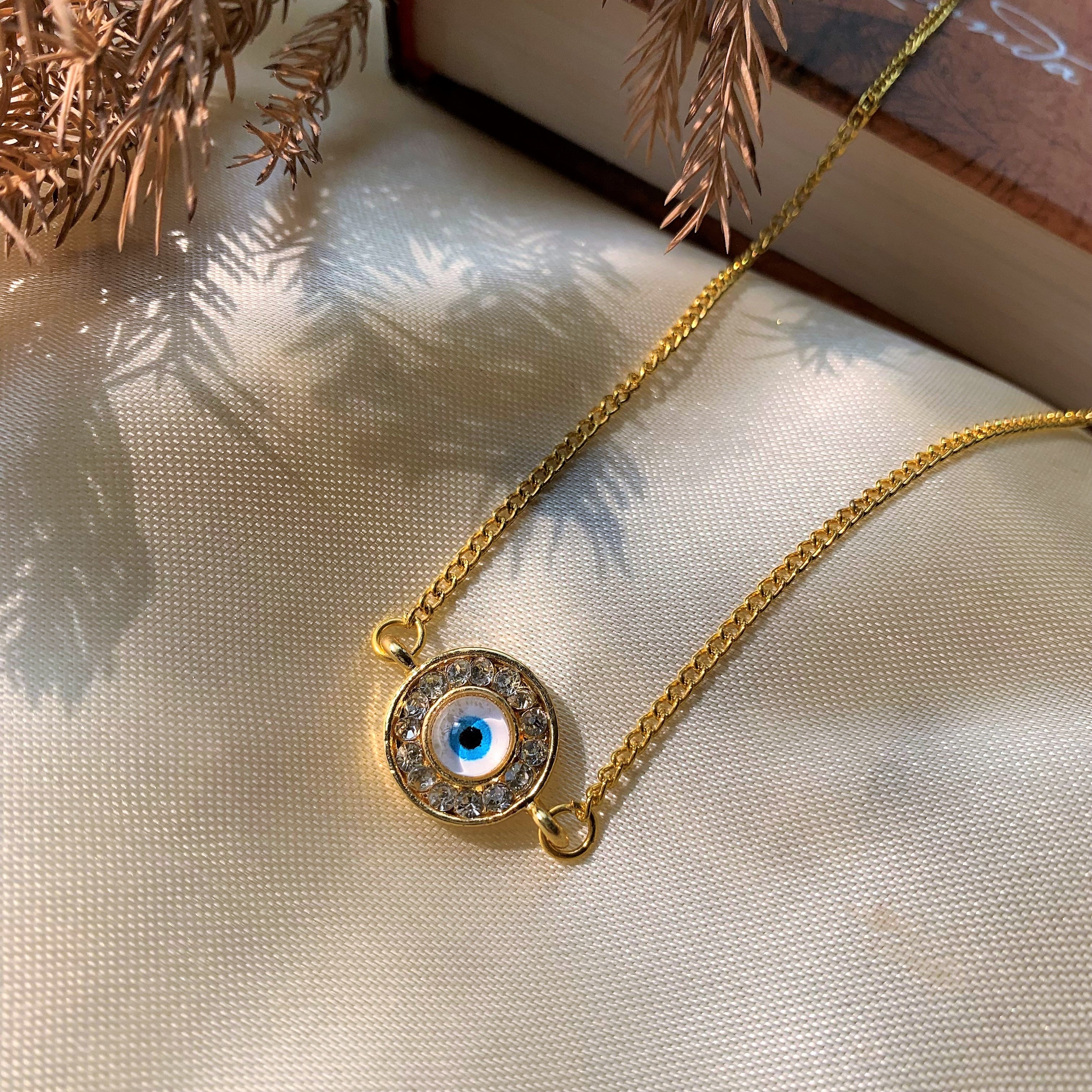 Evil Eye Round Pendant With American Diamonds