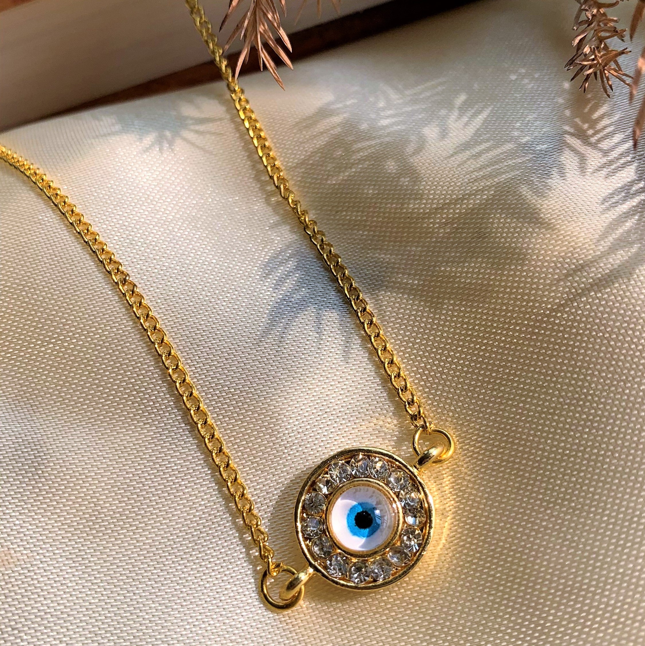 Evil Eye Round Pendant With American Diamonds