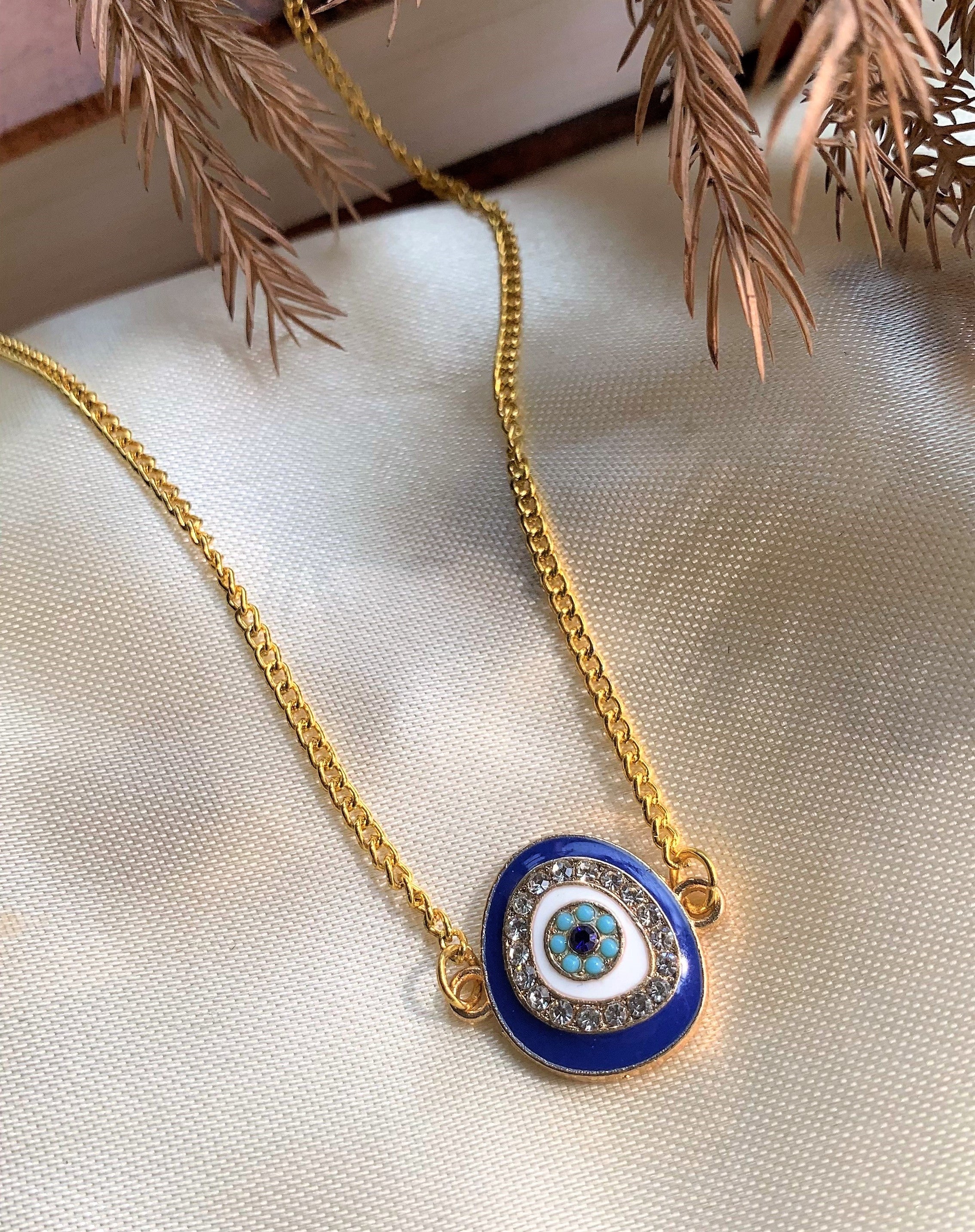 Evil Eye Pendant with American Diamonds