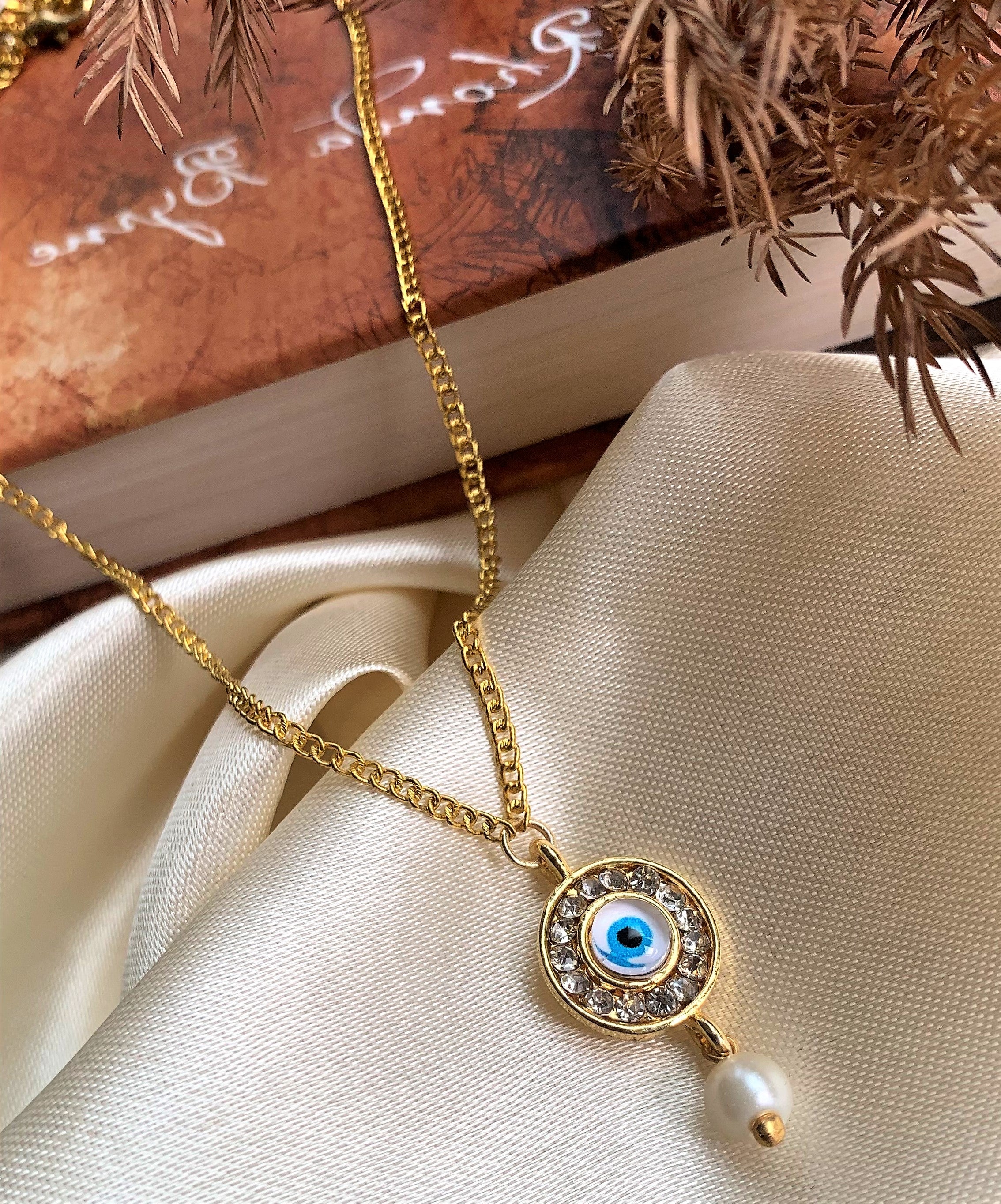 Evil Eye with American Diamond and Pearl Drop Pendant